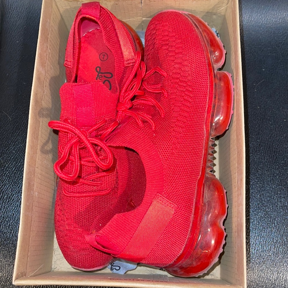 Red women’s athletic shoes